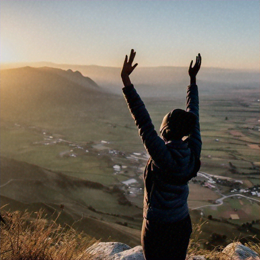 Silhouetted Joy: A Moment of Hope on the Mountaintop