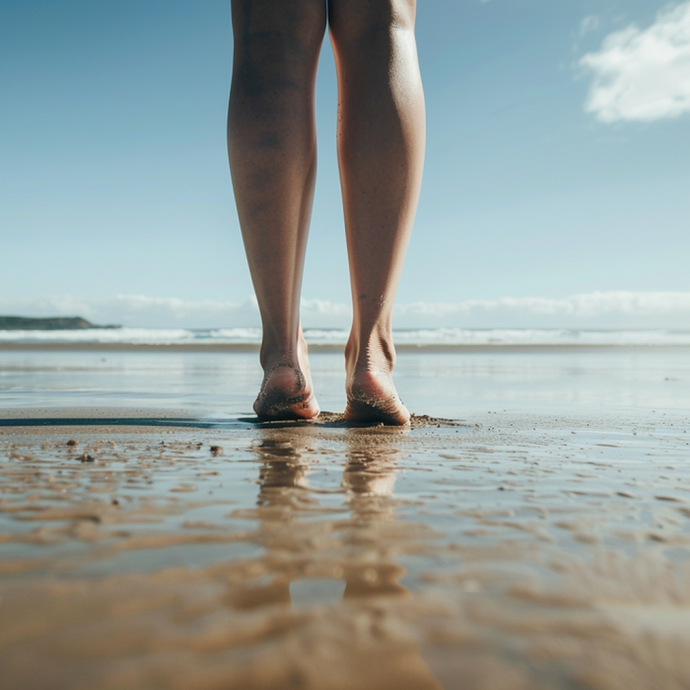 Finding Tranquility: Bare Feet on a Wet Sandy Beach